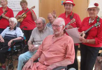 Ukulele's hit right note at sing-a-long in Petersfield Hospital