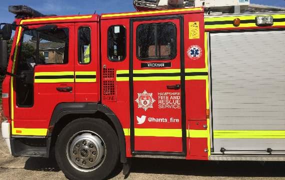 Firefighters spend all night battling large woodland blaze near Farnham