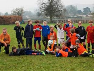 Keen footballers raise more than £2,000 for charity