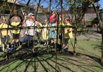 Petersfield Infant School pupils help to create living willow dome