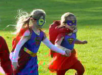 Superheroes travel a sponsored mile for cancer campaign
