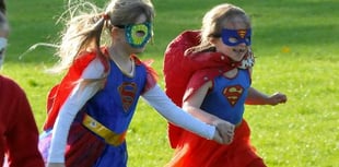 Superheroes travel a sponsored mile for cancer campaign