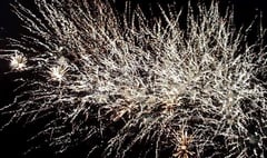 Fireworks fans brave foul weather