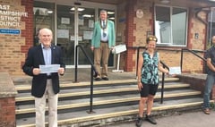 Council chairman gives cheques to chosen charities