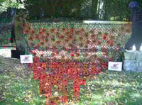 British Legion poppy cascade at Buriton War memorial
