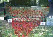British Legion poppy cascade at Buriton War memorial