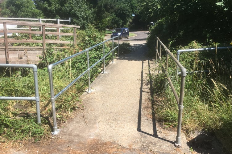 The newly-repaired pedestrian bridge over Drum Stream from Tor Way to the Festival Hall car park in Petersfield