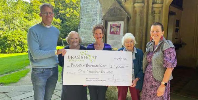 Bramshott Open Gardens presents a cheque for £1,000 to the Bramshott Educational Trust, October 2022.