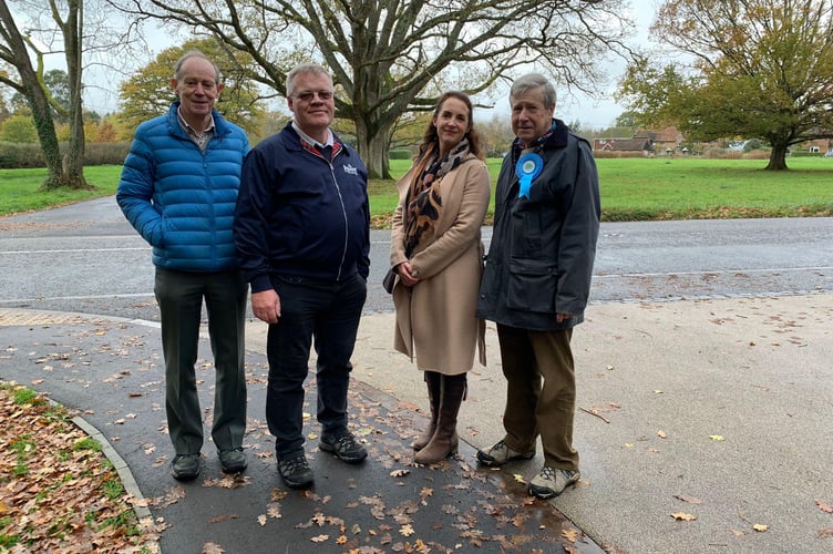Ian Mitchell (second from left) was pictured campaigning with Tory Party activists last Thursday