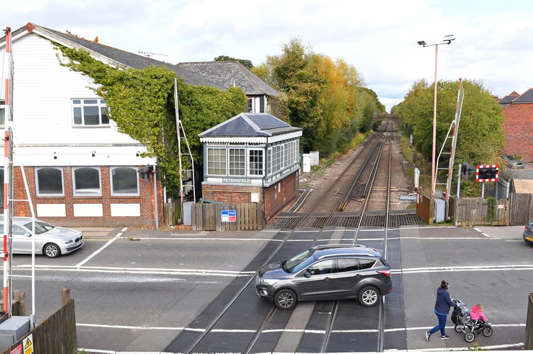 Petersfield signal box and level railway crossing 