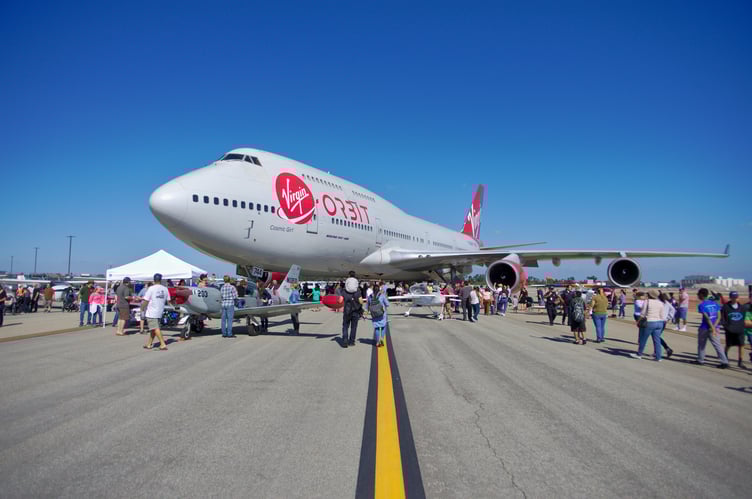 Cosmic Girl is a modified Boeing 747 airplane, used to launch Virgin Orbit's LauncherOne rocket, which carries payloads into space. The LauncherOne rocket is attached to Cosmic Girl under the left wing and is released at high altitude, after which it ignites its engines and continues to climb to space.