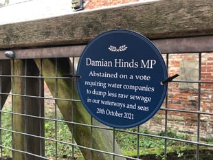 Blue plaques unveiled in Farnham and Alton shaming MPs on river sewage
