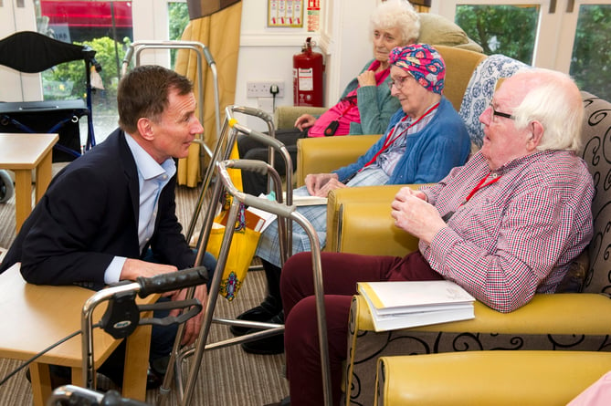 The Rt Hon Jeremy Hunt MP The Chancellor of the Exchequer during his visit to Shottermill House Care Home, Liphook Road, Haslemere, Surrey PICTURES BY STEVE PORTER