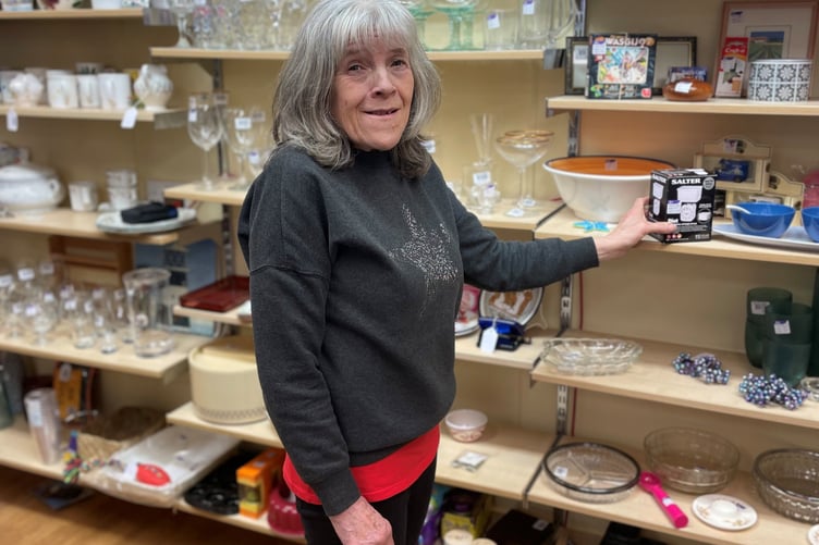 Volunteer Judy Wade at the Scope charity shop in Alton, April 2023.