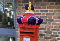 Knitted crown for Petersfield post box to celebrate coronation