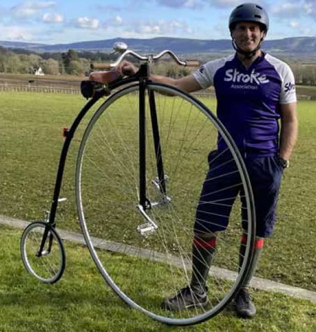 Tom Clowes with his penny farthing, April 2023.