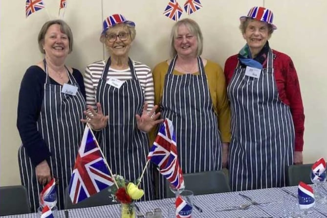 Age Concern put a special coronation touch to its meals at Petersfield Community Centre this week, involving coronation chicken, strawberries and meringue, trifle and wine, May 2023.