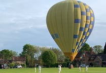 Video: Hot air balloon stops play for Chiddingfold under-tens