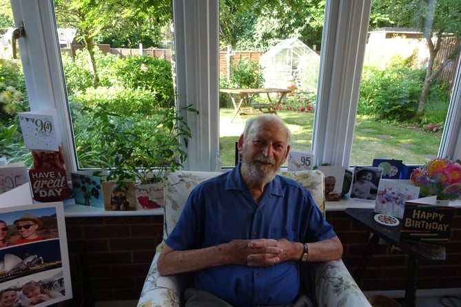 Bordon man Alex Varden with some of the 112 cards he received for his 95th birthday on June 21st 2023. Pic taken June 22nd 2023.