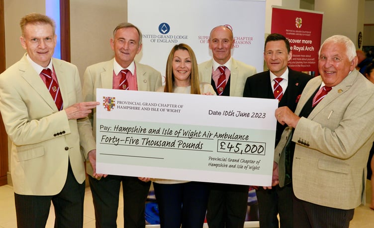 The Provincial Grand Chapter of Hampshire and Isle of Wight Freemasons donate £45,000 to the Hampshire and Isle of Wight Air Ambulance charity, June 2023. From left: Steve Allum, Chris Davis, Jill McDonagh, Jonathan Stainton-Ellis, Jonathan Bell and Dave Wood.
