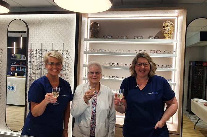 Rawlings staff raise a glass with customers after relocating to 43 High Street, Alton