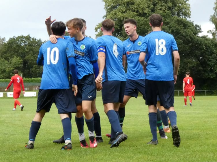 Liss Athletic celebrate one of their seven goals