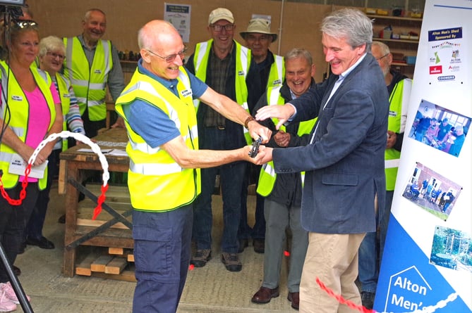 East Hampshire MP Damian Hinds, right, opens the new Alton Men's Shed in Edgar Hall, Anstey Lane, August 5th 2023.