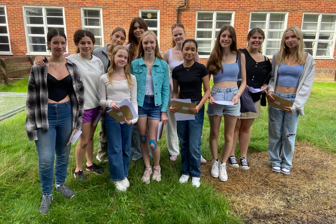 With their GCSE results, from left, are former AmFrom left: Amber Sutherland, Isabel Powell, Hebe Swan, Orla Taylor, Megan Perks, Sophie Pilkington, Chloe Smith, Aleya Sung, Anya Fuller, Amber Andrews and Freya Curtis collect their GCSE results from Amery Hill School in Alton on August 24th 2023.