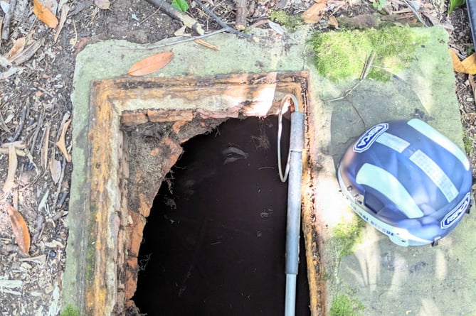 The heartwarming moment a badger was rescued from a manhole in the grounds of a Frensham school has been caught on video by the RSPCA