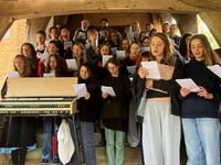 Bedales community pays respects with poignant Remembrance service
