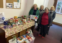 Exercise group makes (keep) fitting donation to Liss Food Bank