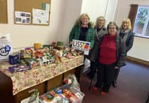 Exercise group makes (keep) fitting donation to Liss Food Bank