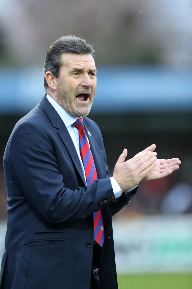 Aldershot Town manager Tommy Widdrington