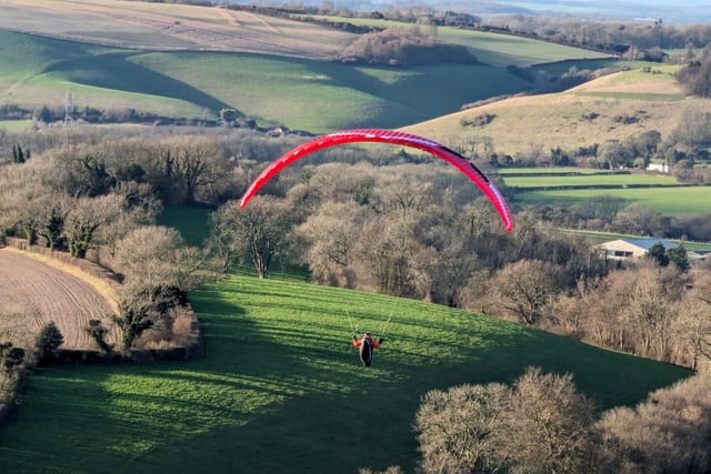 Sky Surfing Club members fly from Butser Hill near Petersfield