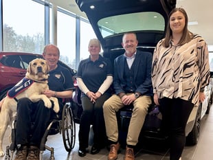 Dealership welcomes driving force behind East Hampshire canine charity