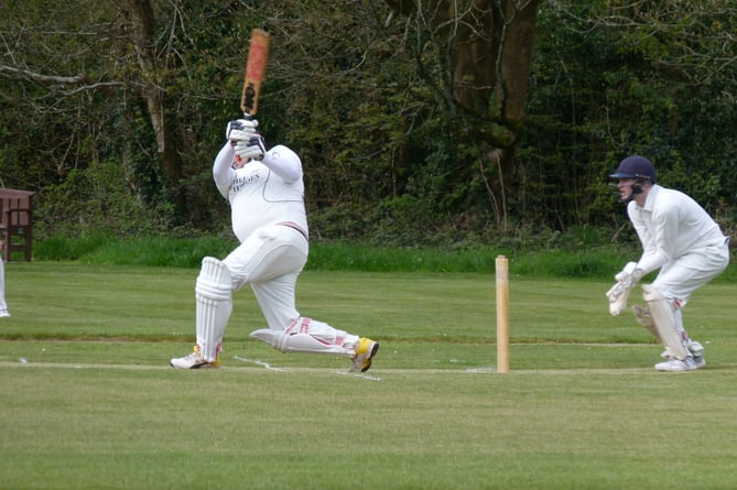 Waverley's Jim Wright crashes a boundary during his record innings