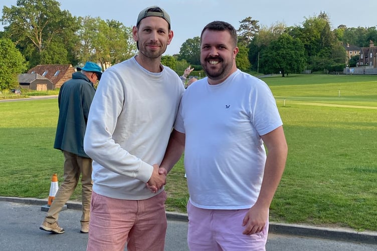 Tilford skipper George Ellis (left) congratulates Tilford player of the match Ben Matthews