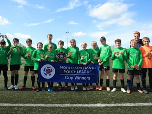 Under-12 Terriers win cup final to end season with a trophy