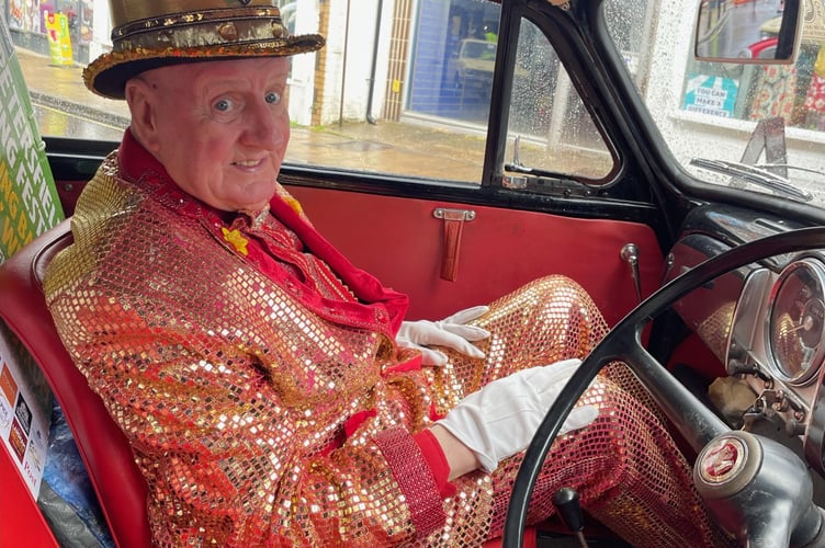 'Mr Petersfield' David Weeks in one of the classic cars at the festival