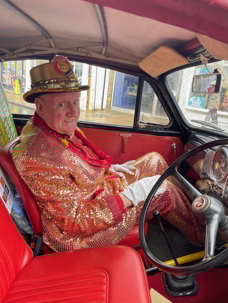 'Mr Petersfield' David Weeks in one of the classic cars at the festival