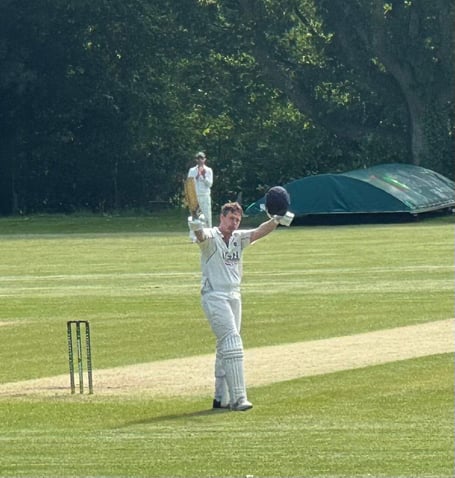 Petersfield's James Walton celebrates reaching his century