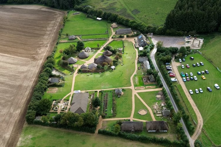 An aerial shot of Butser Ancient Farm, the new foundations of the building can be seen in the top right