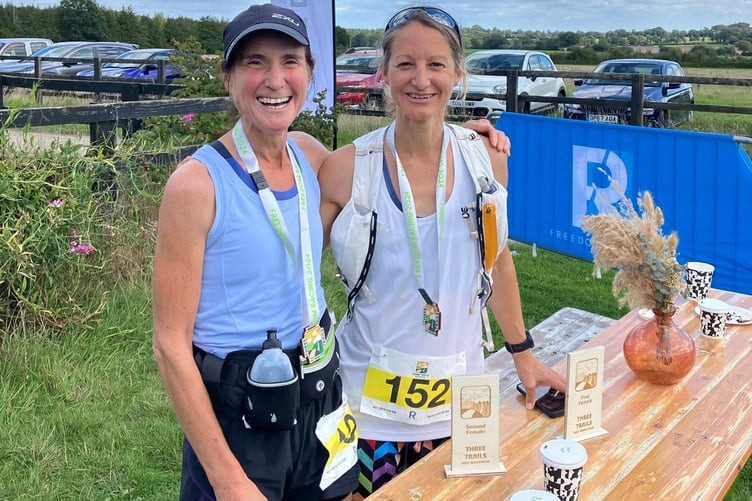 Susie Adams and Sarah Smith celebrate their success at the Three Trails Half