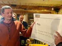 VIDEO: Residents bid a merry farewell to beloved delivery driver 