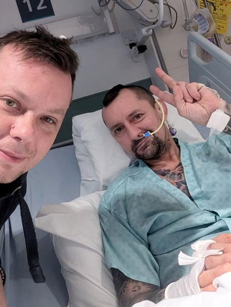 Pawel Koslicki, 45, with best friend Lukasz Dabrowski. A dad-of-two has been left with a brain injury and several broken bones after a huge motorcycle accident- which shut down part of the motorway for over six hours. Release date January 14, 2025. Pawel Koslicki, 45, sustained critical injuries during the crash on the M25 near Junction 15 for the M4 on November 17. The accident, involving a red Yamaha motorcycle and a blue Mercedes S350 AMG, led to Pawel being airlifted to the hospital where he remains in serious condition. Emergency services closed a stretch of the motorway for more than six hours, and Thames Valley Police are appealing for witnesses or anyone with dashcam footage. The dad and avid motorcyclist has been left with a brain injury, multiple broken bones, and internal damage to his kidney, liver, and lung. He currently cannot move his right arm, eat or drink unaided, and struggles with memory issues. His best friend of ten years, Lukasz Dabrowski, 41, who lives in Havant, Hampshire, says Pawels condition is improving, but that he may never fully recover.