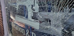 Explosion shatters shop window on eve of anniversary