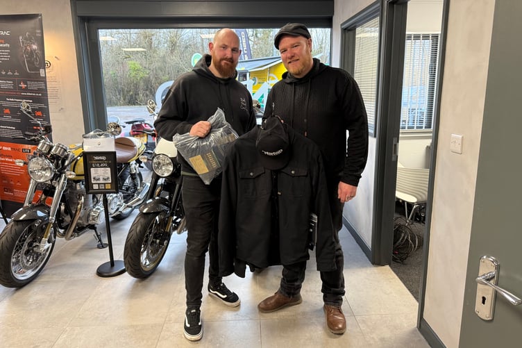 South Downs Motorcyles General Manager, Paul Smith with competition winner Luke Rosvall.