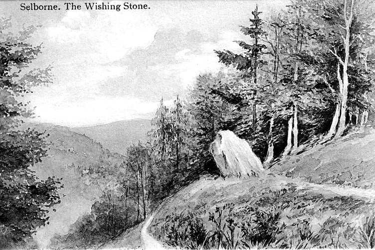 An undated postcard of Selborne’s Wishing Stone leaning majestically over a much less-wooded Zig-Zag Path.