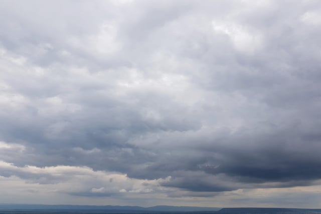 Overcast with possible rain, sunshine later, fair tomorrow