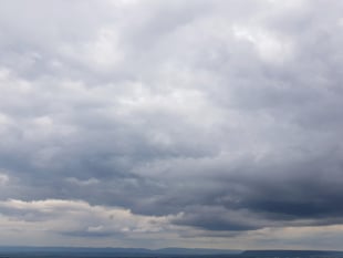 Partly cloudy today with a slight chance of rain, sunny tomorrow